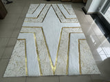 Geometric Plush Faux Leather White Gold Area Rug